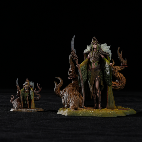 Comparison of 75mm master-painted Sylvan Queen Galadren figure beside a standard 32mm miniature for scale.
